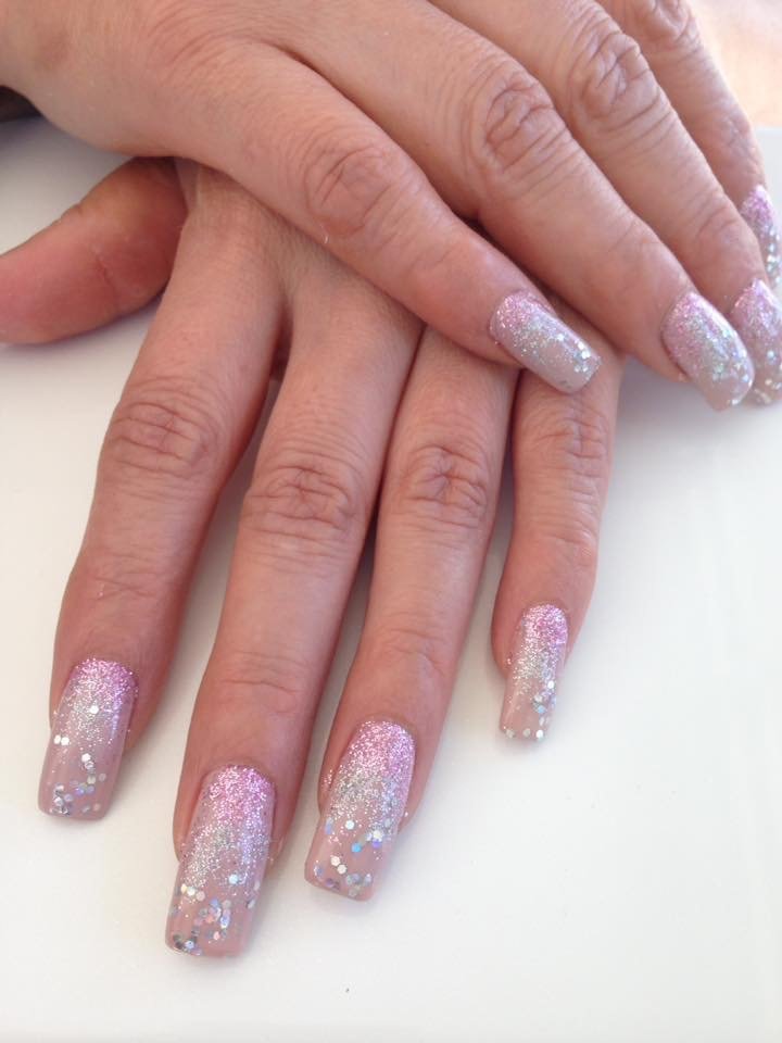 Manicured nails with glossy polish.